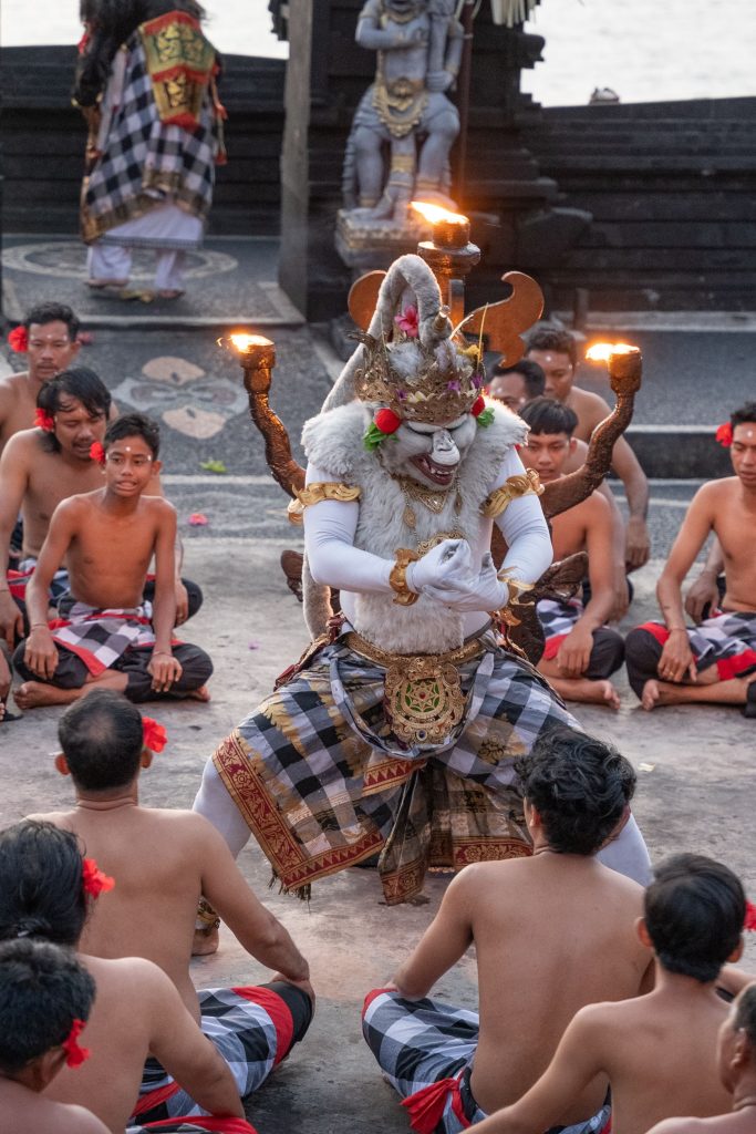 Kecak dancers in costume during a performance in Bali